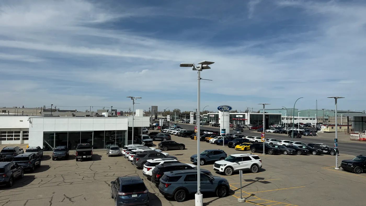 Driving Change Automotive Group dealership lot with the full vehicle inventory