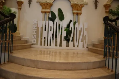THRIVE 2025 conference sign at the British Colonial Hotel in Nassau